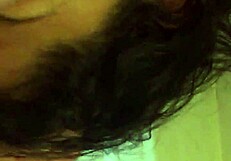 Latina couple enjoys sucking on a big candy cane together