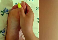 Petite Babe Strokes Her Sexy Feet With Pink Pedicure