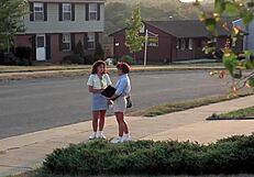 majorettes undress in sexy bikinis by the pool