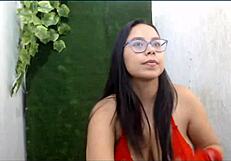 this babe is teasing her tits with a dildo