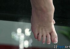 This euro babe is giving a footjob, so hot