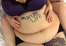 Two BBWs play with each other's bellies