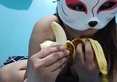 Busty Asian Babe Enjoys Fruit Fetish with Banana in Solo Play