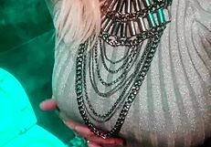 Slutty minx pissing and fondling pussy in the public toilet at the club