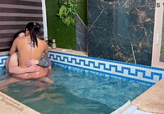 Is my girlfriend's friend bent over for doggystyle riding in the pool?