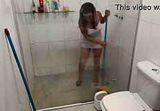 hot slut cleans while showing off her pussy and masturbating