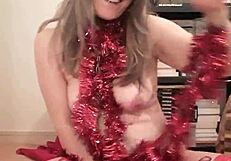 Enjoy a festive striptease with undressing and ripped clothes.