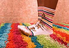 Is Keeani's slutty little 18+ socks teasing you with a footjob on shaved feet?