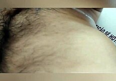 Intense gay encounter unfolds in a luxurious hotel room with passionate kissing and deep penetration.