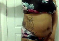 Can you resist this big-tit ebony MILF dancing seductively in the bathroom?