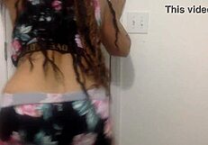 Can you resist this big-tit ebony MILF dancing seductively in the bathroom?