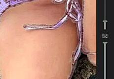 African beauty in bikini on the beach gets me jerking off.