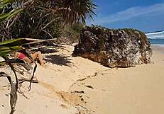 I stroll along paradise beach, my sandy ass plugged with a red butt plug.