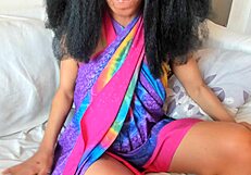 Ebony milf plays with toys on wet pussy