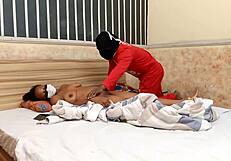 She returns from work just to get drilled by an arm rubber toy. Her shaved body quivers with every thrust!