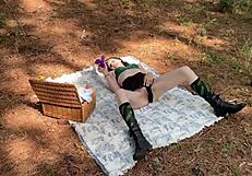 woman uses dildo for outdoor solo orgasm