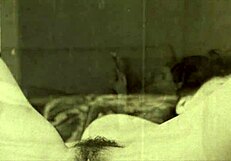 in this retro scene, a woman undresses and gives a blowjob