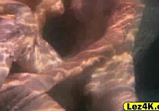 Gorgeous Lesbians Explore Wet Pussy Play in Pool