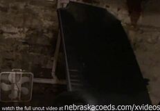 Very tanned chick masturbates upside down in basement