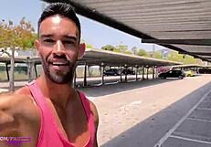 The sexy exhibitionist man enjoys flashing in the parking lot.