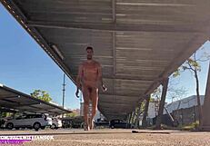 The sexy exhibitionist man enjoys flashing in the parking lot.
