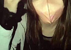 Beautiful Asian ladyboy shows ass in shade while masturbating