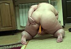 mature bbw uses carrots for anal masturbation in early morning, shaking big booty in doggy style