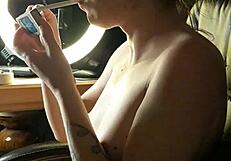 The mature asian stepsister lights up a cigarette and seduces with her sexy smoking fetish