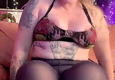 Woman in heels and leggings masturbates in black pantyhose