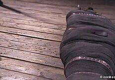 Mummified Brunette Endures Whipping