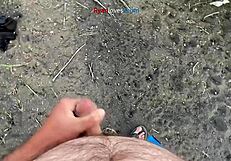 brunette masturbates cock under bridge in homemade solo