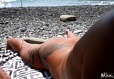 close up blowjob on the beach with cum in mouth