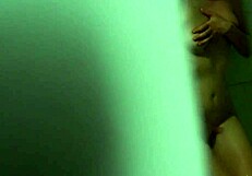 Emily takes a steamy shower, unaware of voyeur eyes watching her.