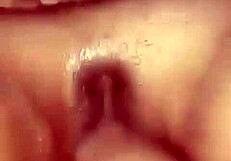 Intensely fisting my wife's pussy in doggystyle position at home