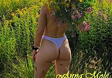 public erotica with anna mole, her small gorgeous breasts shine in nature shorts