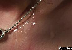 foxy hottie gets a cumshot on her face and gulps all the semen.