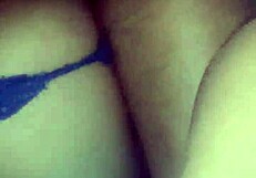 Young and unfaithful Hispanic beauty on her knees in a thong.