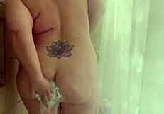 Just watching this milf clean her pussy in the shower