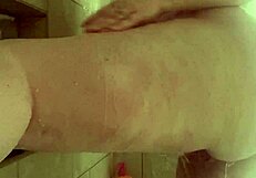 Just watching this milf clean her pussy in the shower