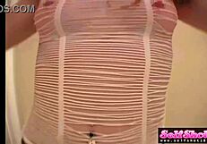 megan teases her sexy body in fishnet clothes and stockings