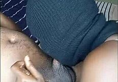 Amateur black woman sucking and blowing on a big cock like it's her dinner.