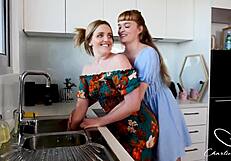 laney eats out charlies pussy while her hand is stuck in the sink and she is at her mercy.