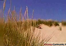 Lill toys her pussy outdoors.