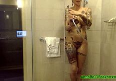 Anna Bell Peaks strips for steamy shower solo