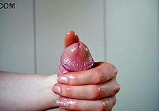 how to slowly handjob a big lubed cock with amateurs