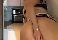 big-assed milf cleans kitchen with toys