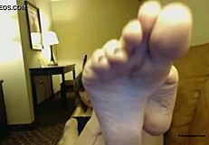 She teases with her feet on webcam, that sexy emo tranny