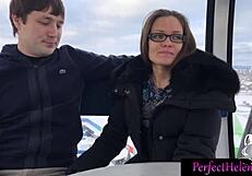 A young brunette woman engages in public interactions with strangers at the resort, leading to an unexpected encounter