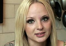 A woman with big tits takes black cock in her ass orally