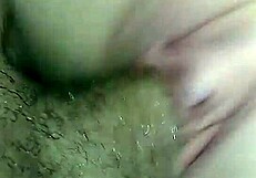 A mature milf performs a sloppy blowjob on a young big black cock and squirts everywhere